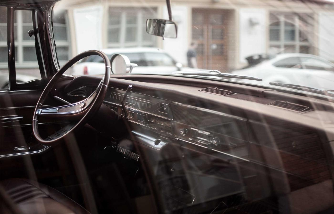 A group of artists collaborating in a bright studio space.